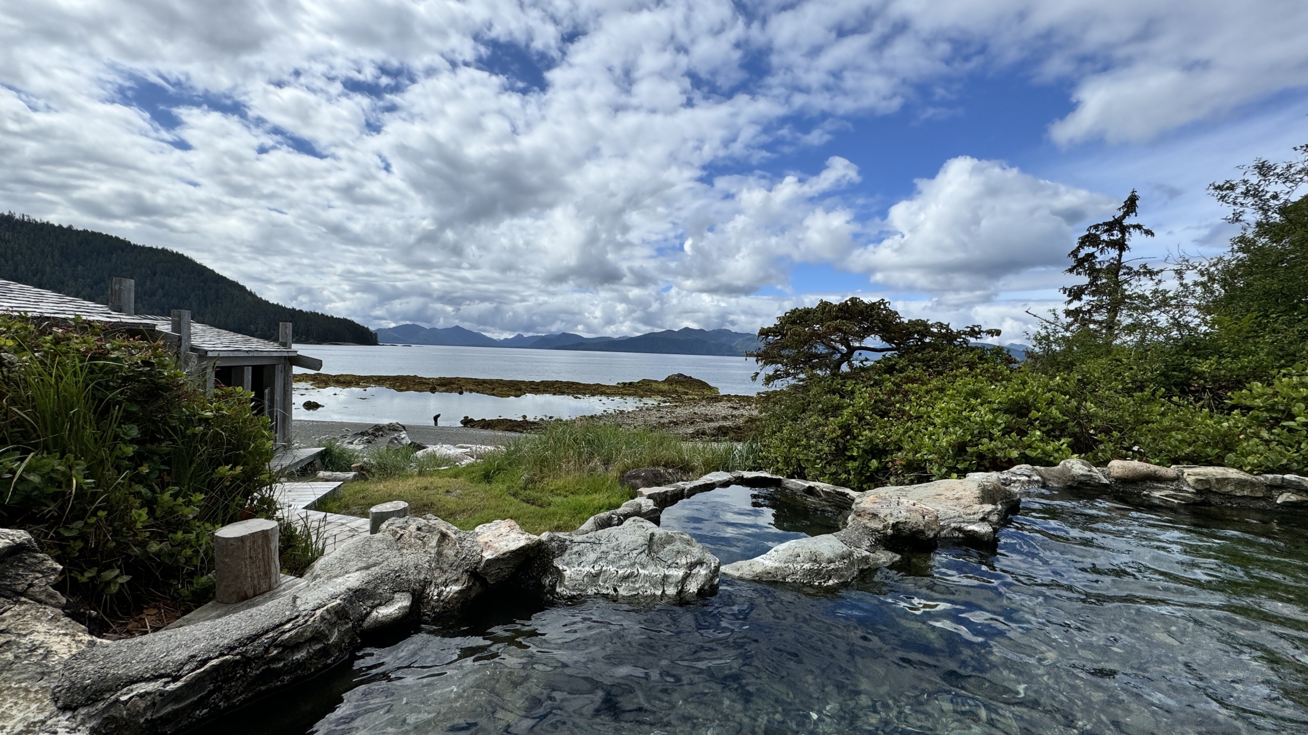Natural hot spring tide pools overlooking ocean in Haida Gwaii