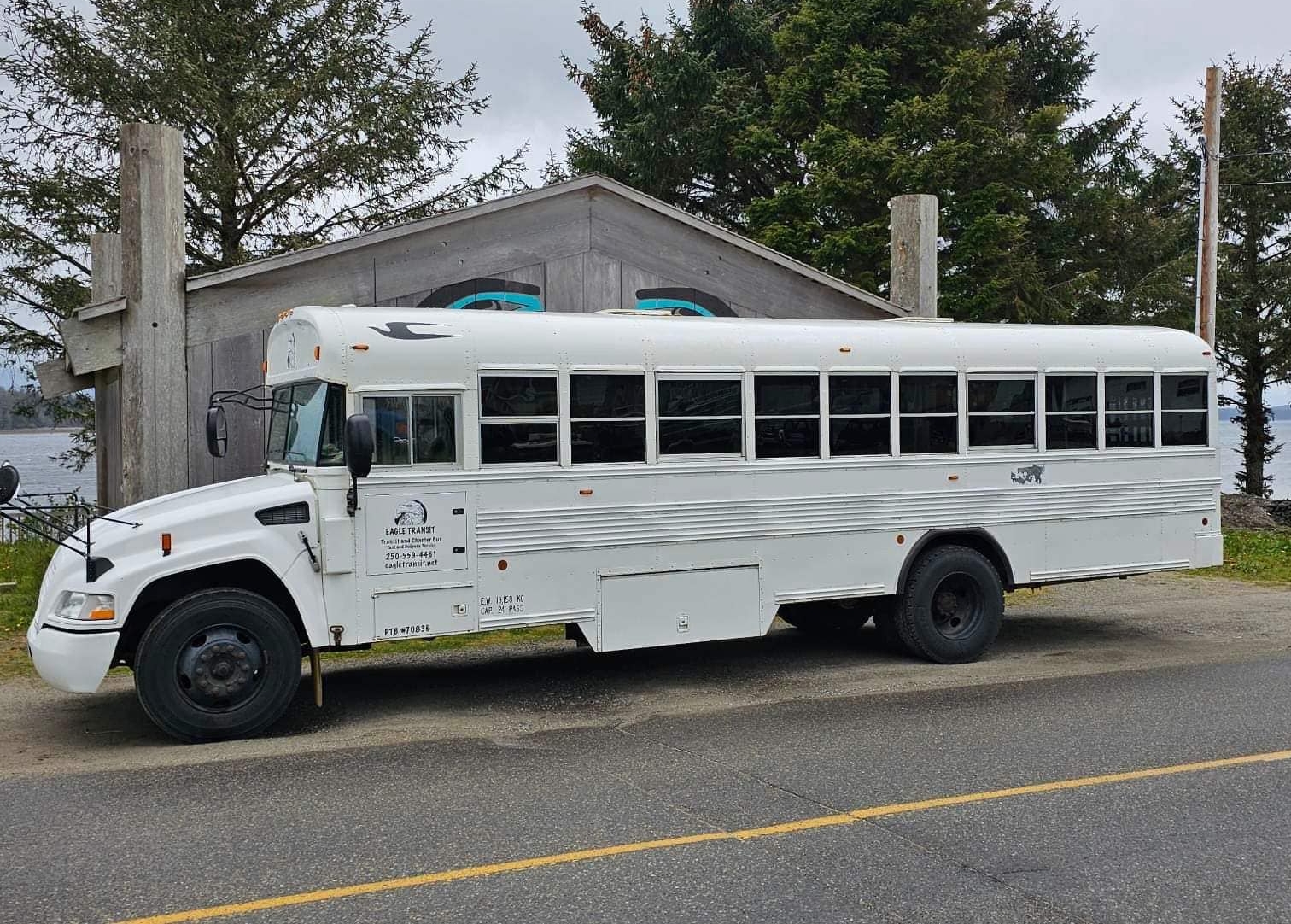 White bus from Eagle Transit in Haida Gwaii
