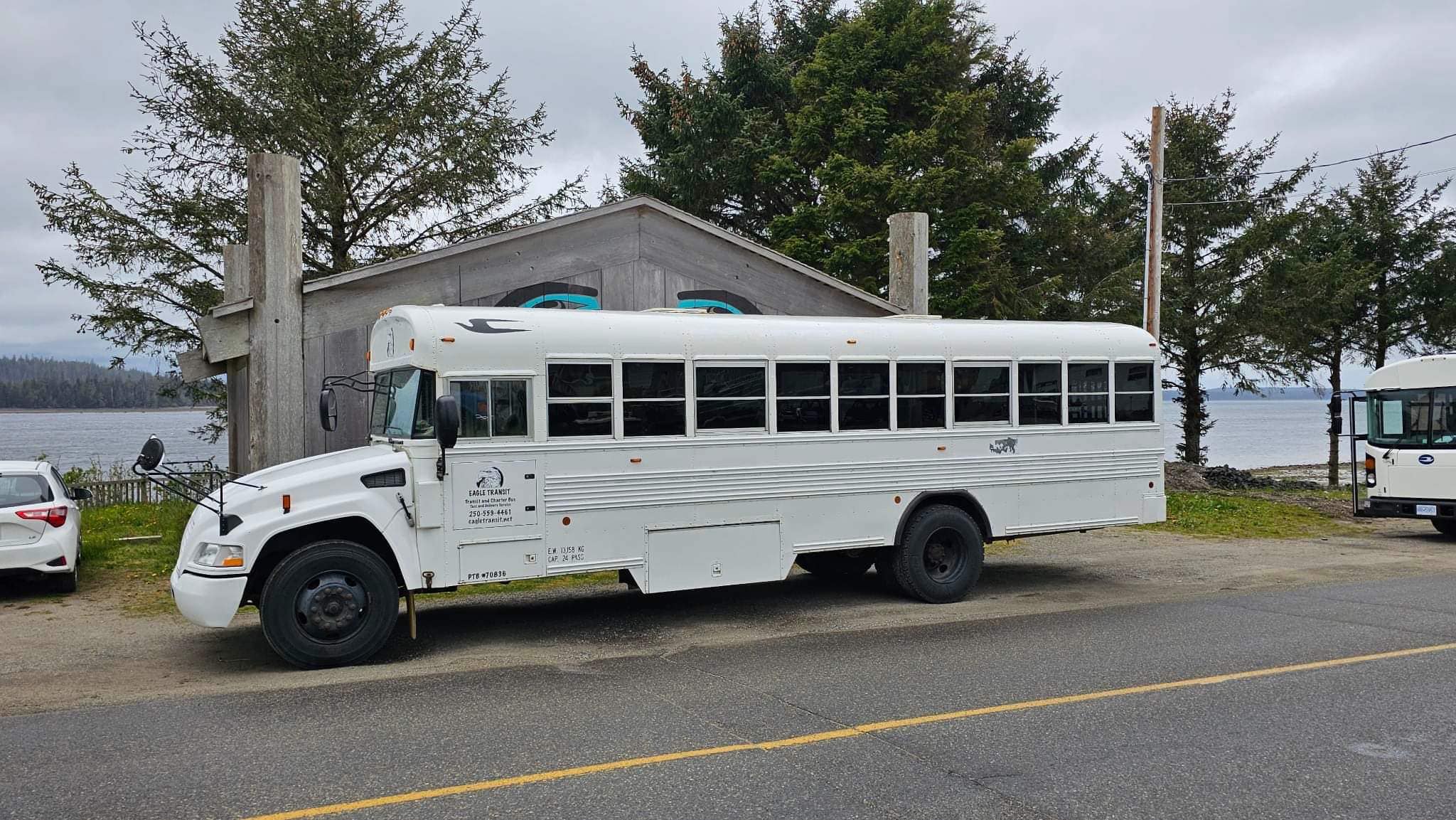 White bus from Eagle Transit in Haida Gwaii