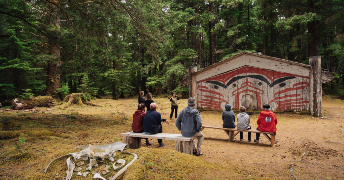 Guests on an Indigenous cultural tour in Haida Gwaii with Haida Style Expeditions