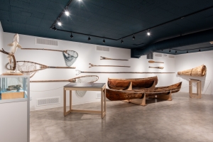 Secwepmc Museum interior featuring canoes on display